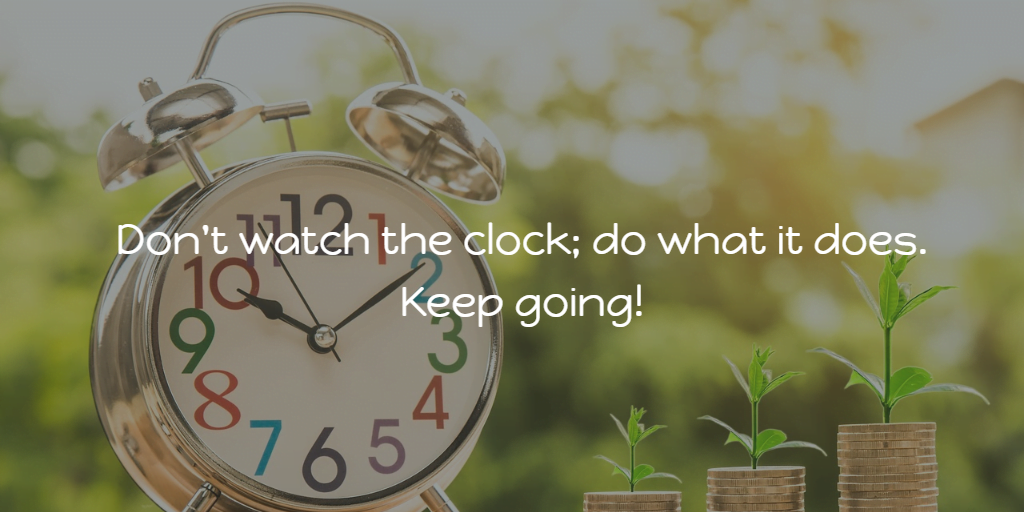 An image of a clock face with plants growing on coins.