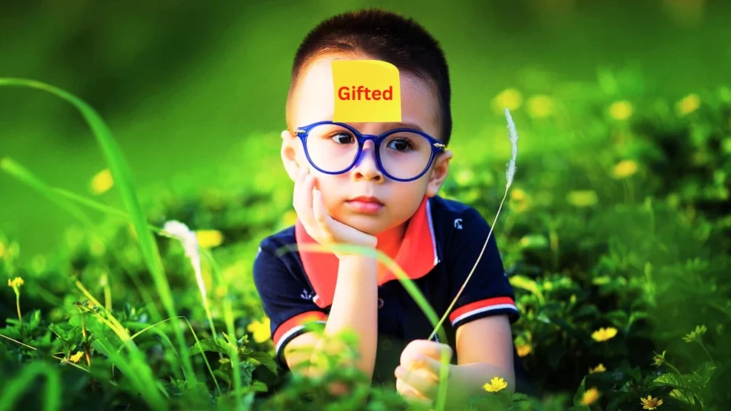 Image of a child labelled as "Gifted", emphasizing that labelling can lead to self-doubt and the impostor syndrome.